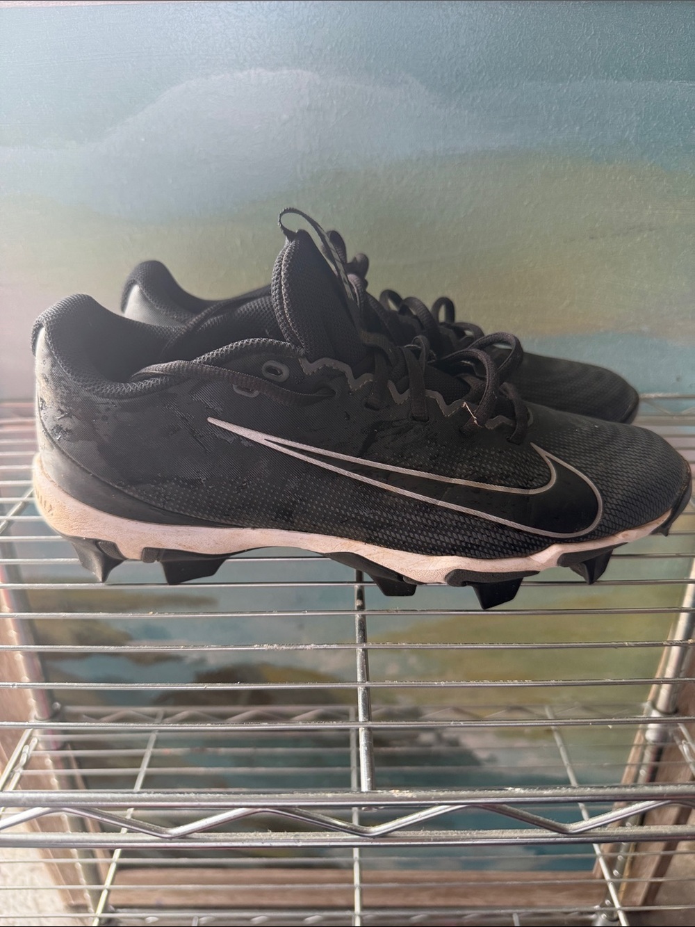 Nike Black Baseball Cleats with White Swoosh Accent